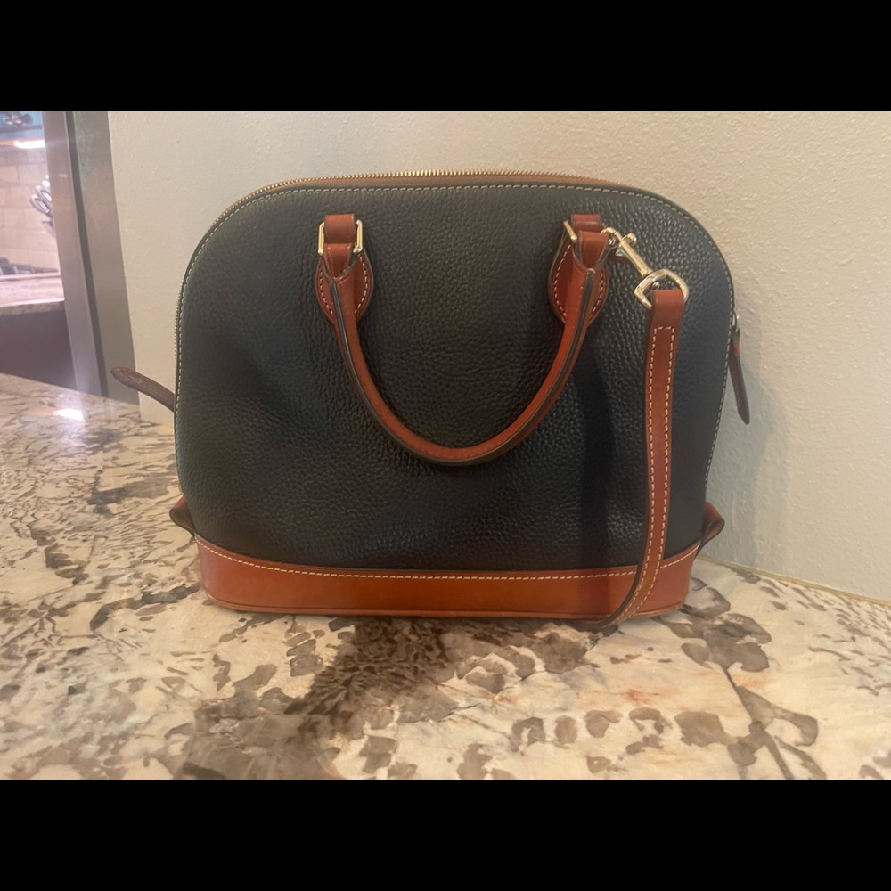 Dooney & bourke purse.  In great condition!   Purse has been stored in a bag.